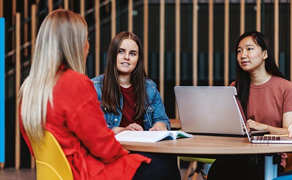 Students having a chat on campus